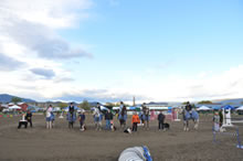 Group photo of all the dog and horse teams that competed.